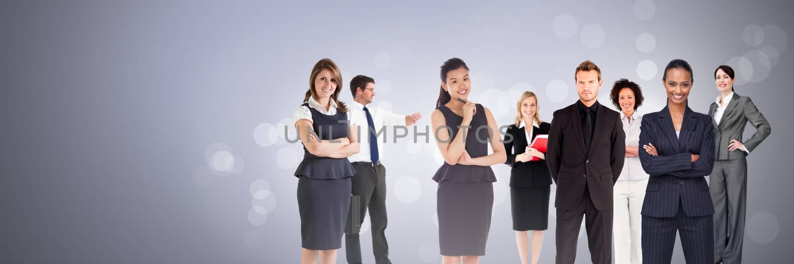 Digital composite of Business people with flare light source