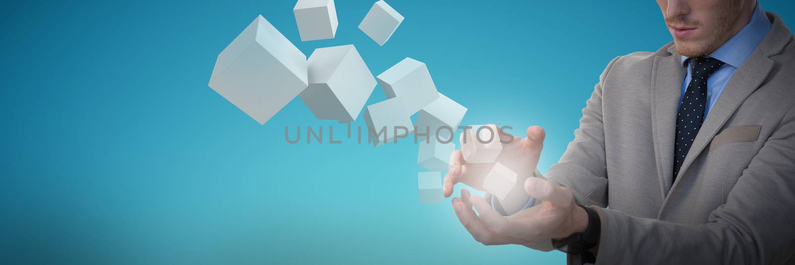 Composite image of businessman holding object by Wavebreakmedia