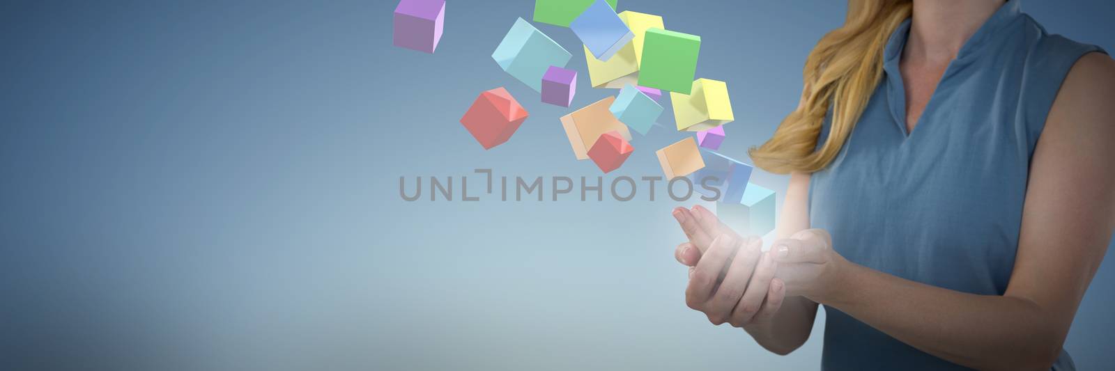 Mid-section of Businesswoman working with object against abstract blue background