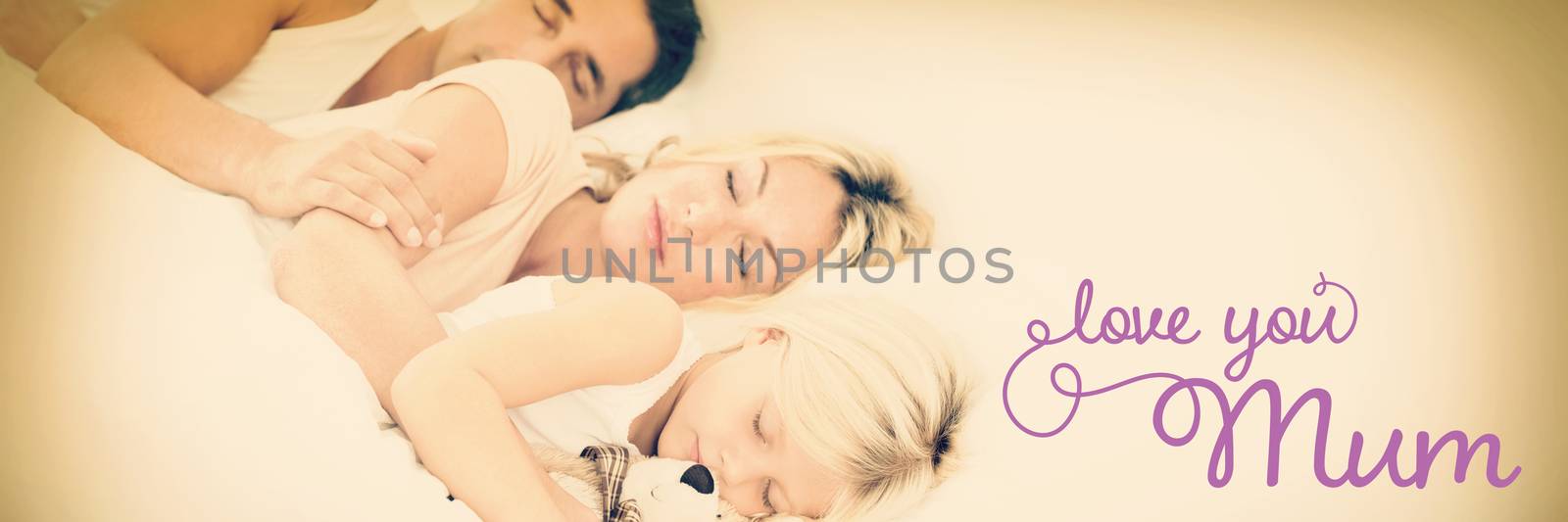 Composite image of family sleeping together by Wavebreakmedia