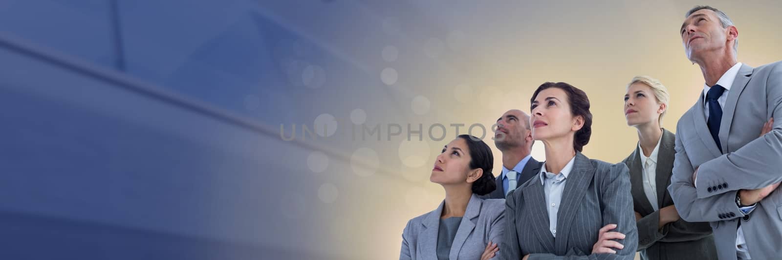 Digital composite of Business people and building with flare light source