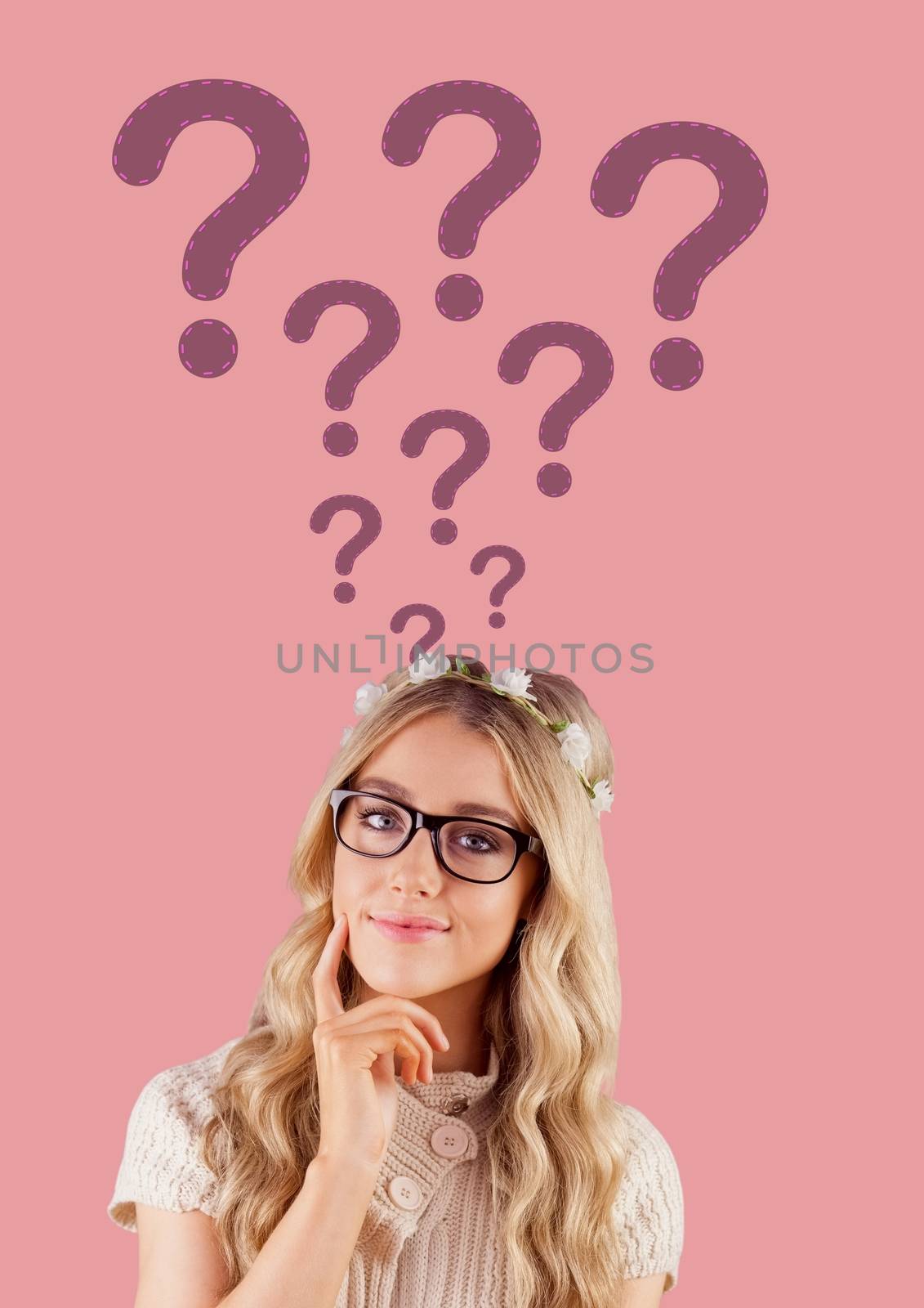 Digital composite of Woman thinking with stitched question marks