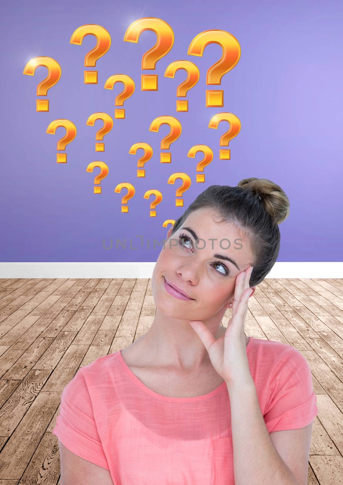 Digital composite of Woman thinking with gold question marks