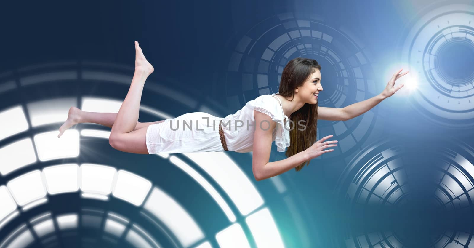 Woman floating flying with Glowing circle technology interface by Wavebreakmedia