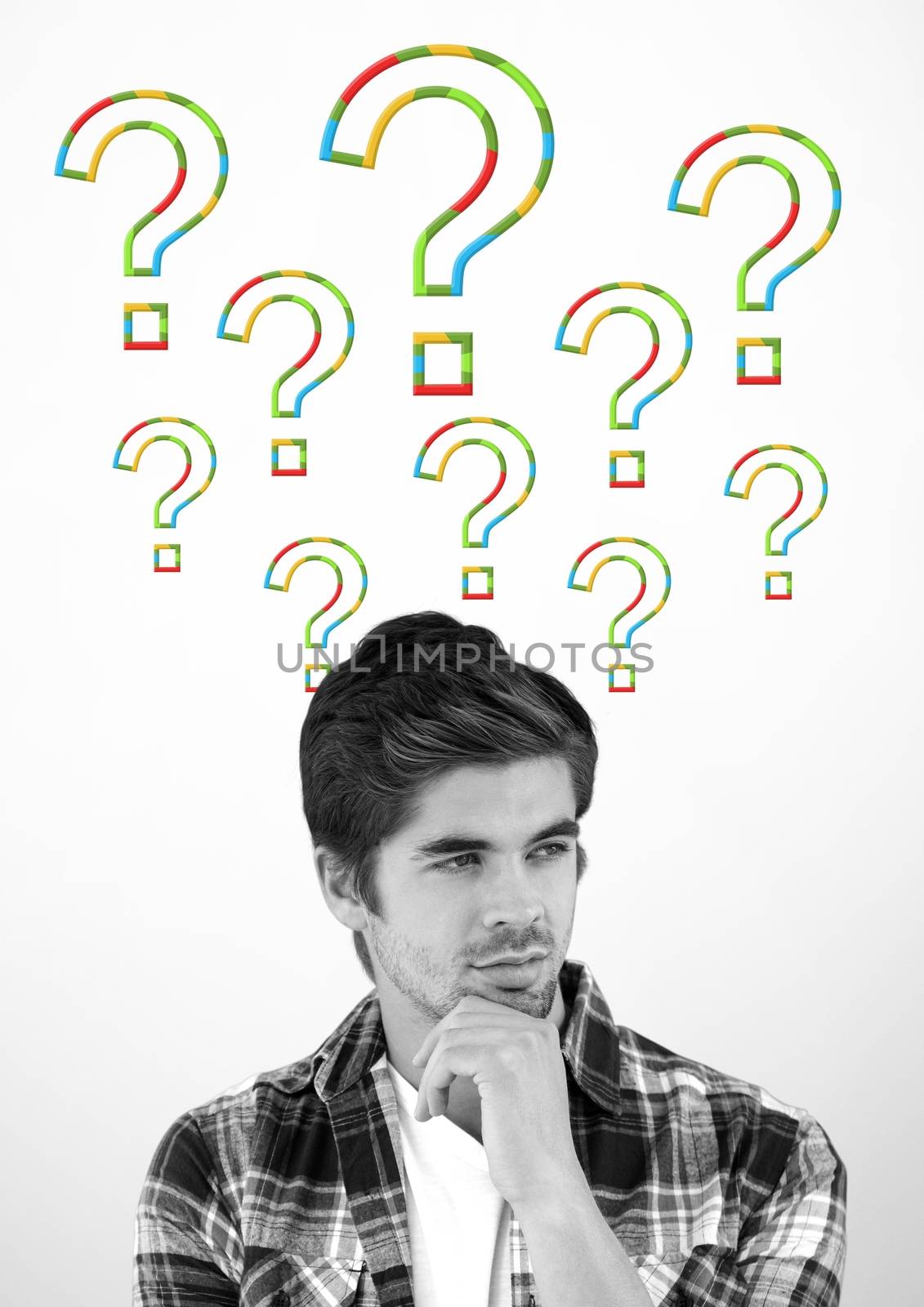 Digital composite of Man thinking with colorful question marks