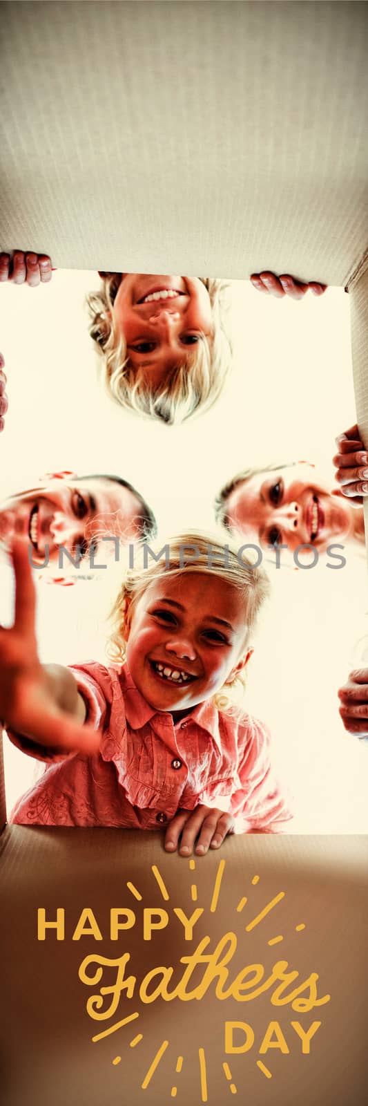 Composite image of happy family unpacking boxes  by Wavebreakmedia