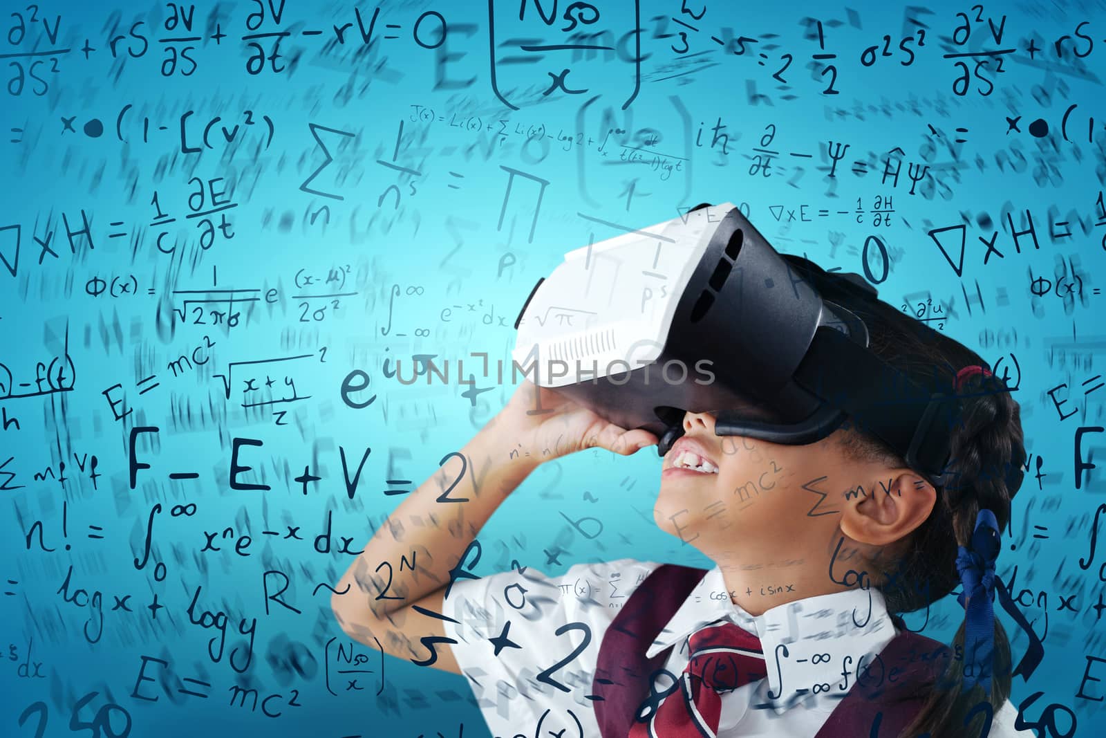 Composite image of close-up of schoolgirl using virtual reality headset by Wavebreakmedia