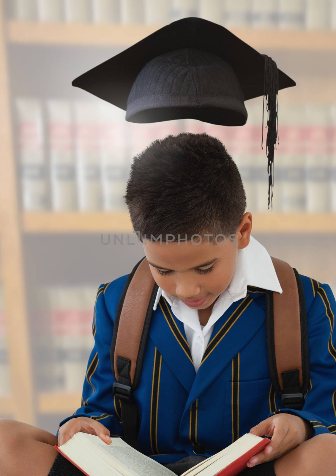 Digital composite of Boy with graduation hat in education library