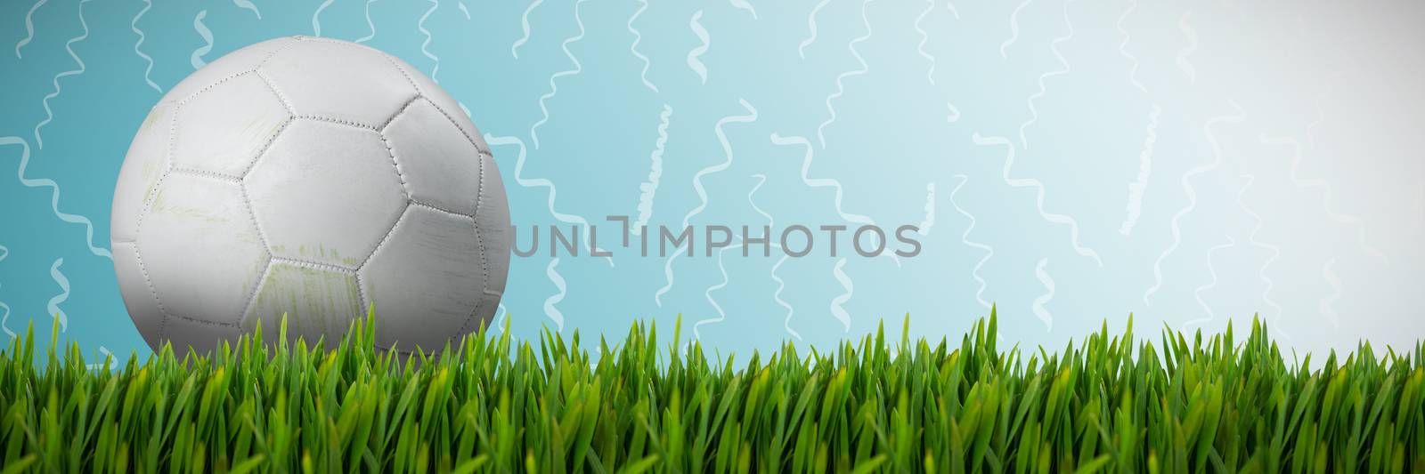 Grass growing outdoors against abstract blue background