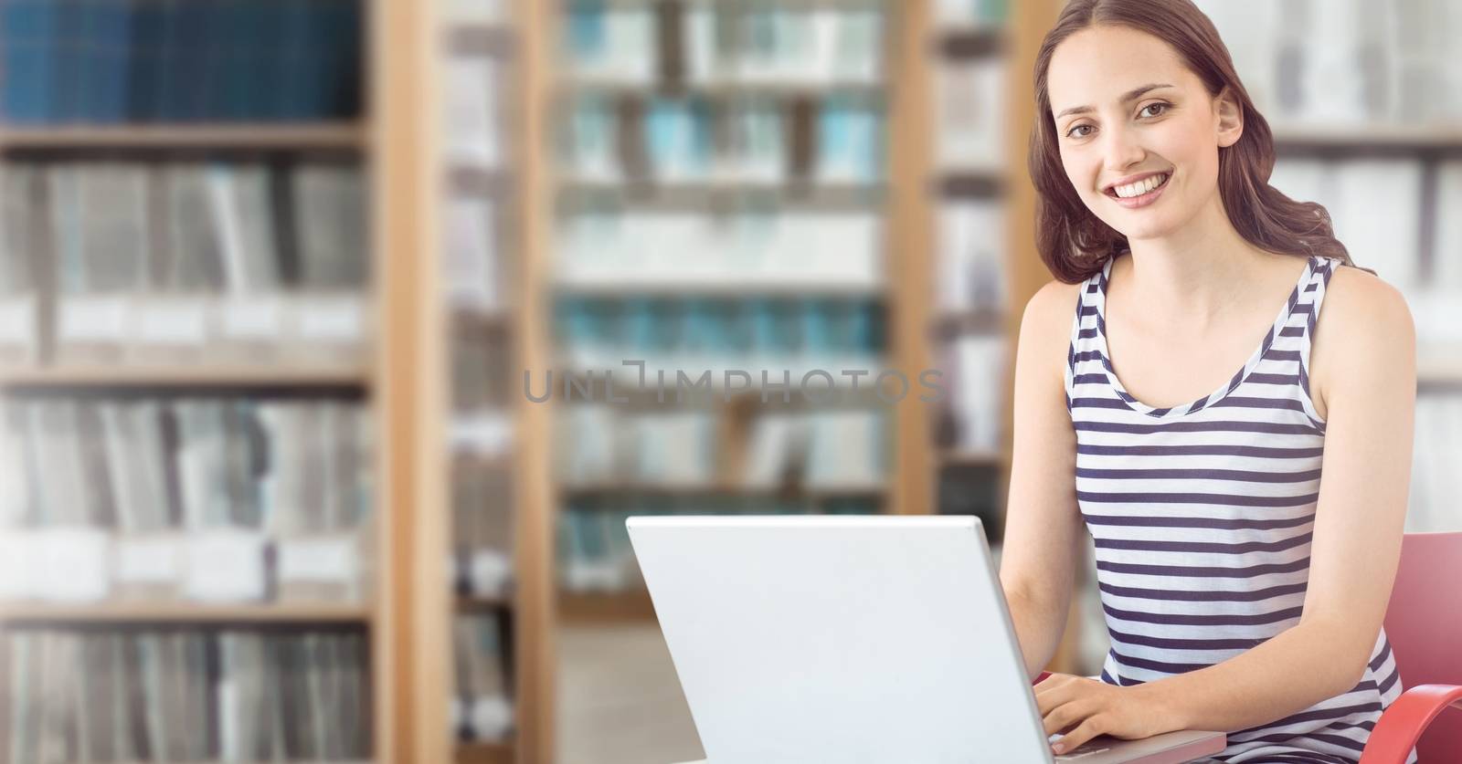 Student woman in education library by Wavebreakmedia