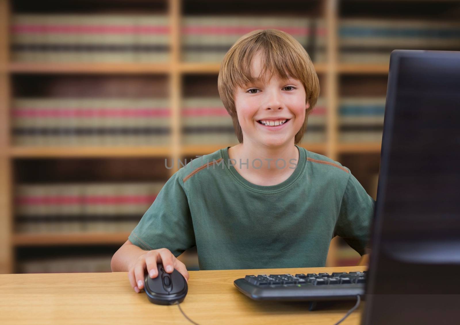 Digital composite of School boy in education library