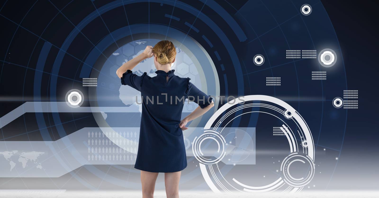 Woman looking at technology information interface by Wavebreakmedia