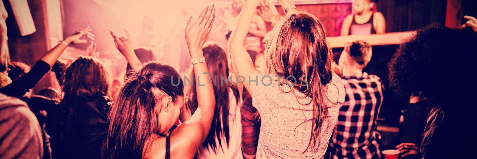 People enjoying in nightclub by Wavebreakmedia