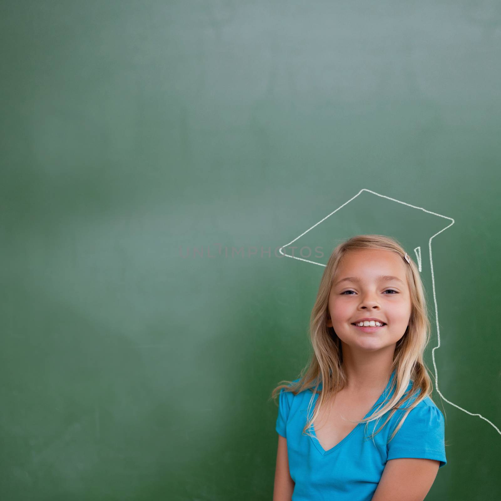 Composite image of cute pupil with graduate outline by Wavebreakmedia