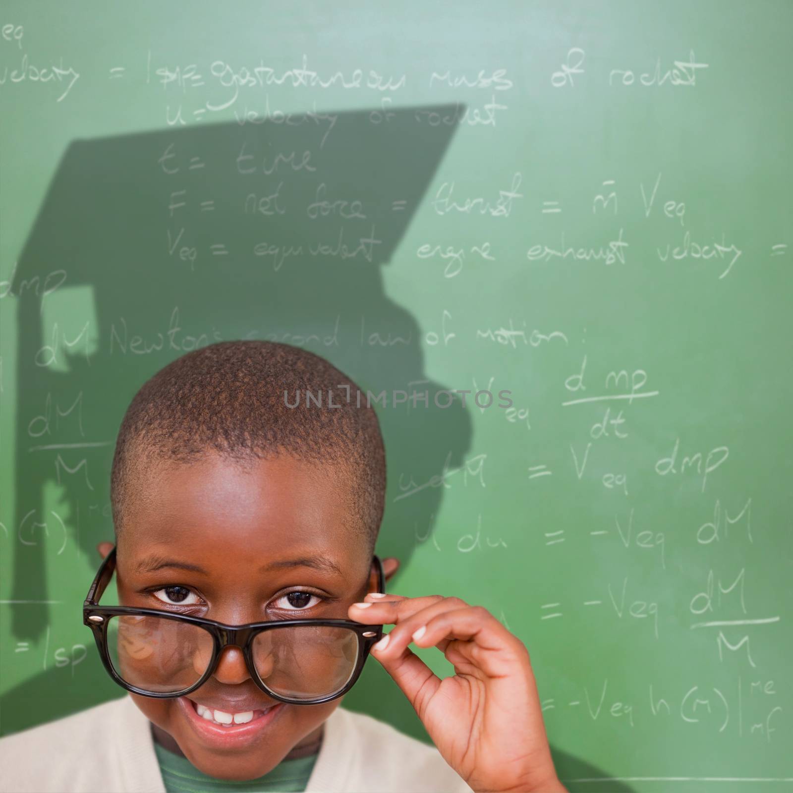 Composite image of cute pupil with graduate shadow in classroom