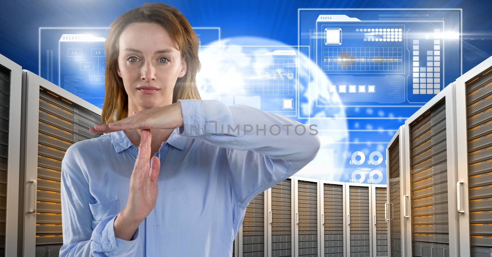 Woman with computer servers and technology information interface by Wavebreakmedia