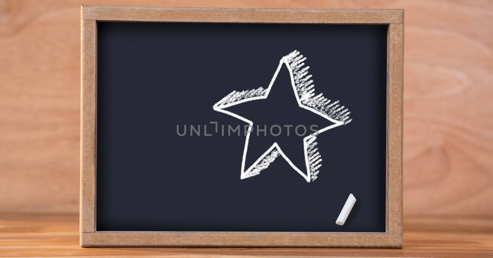 Digital composite of Star Education drawing on blackboard