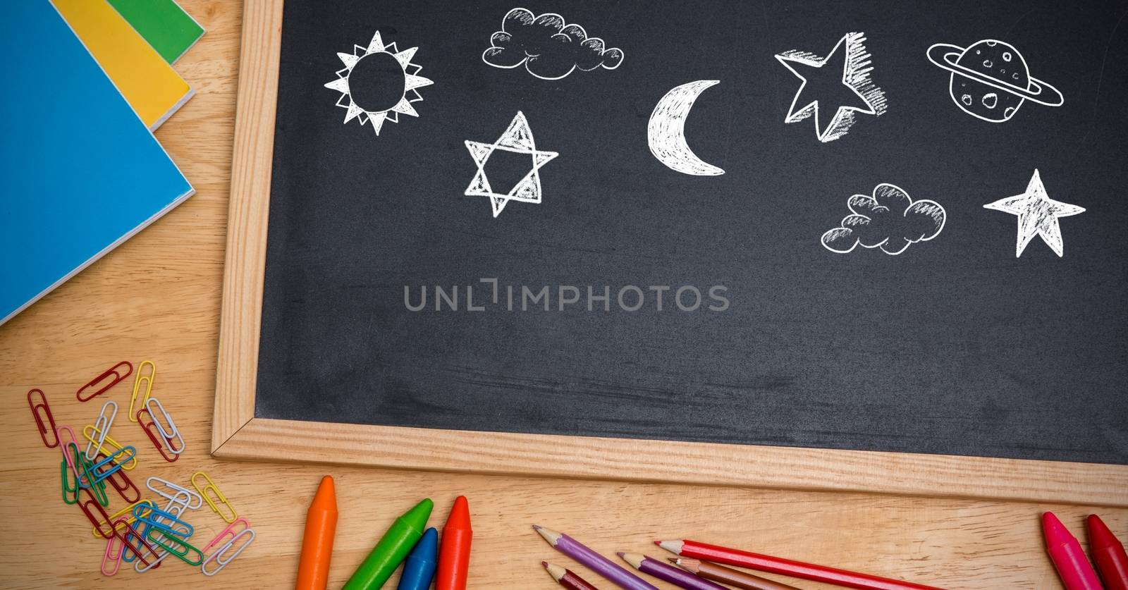 Digital composite of Moon and stars Education drawing on blackboard for school