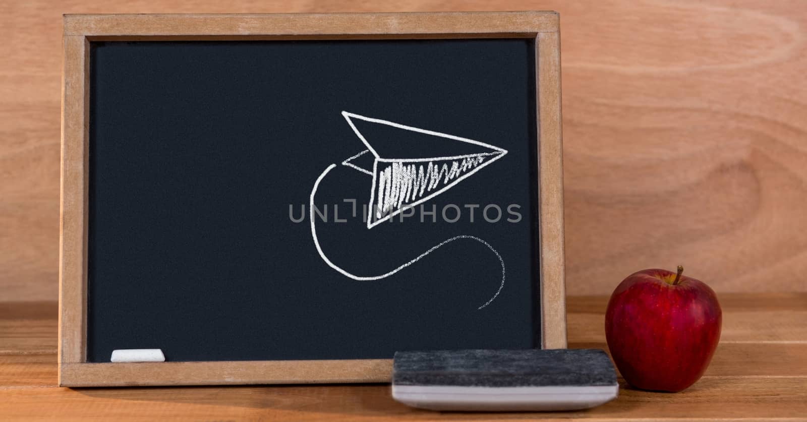 Digital composite of Paper airplane Education drawing on blackboard for school