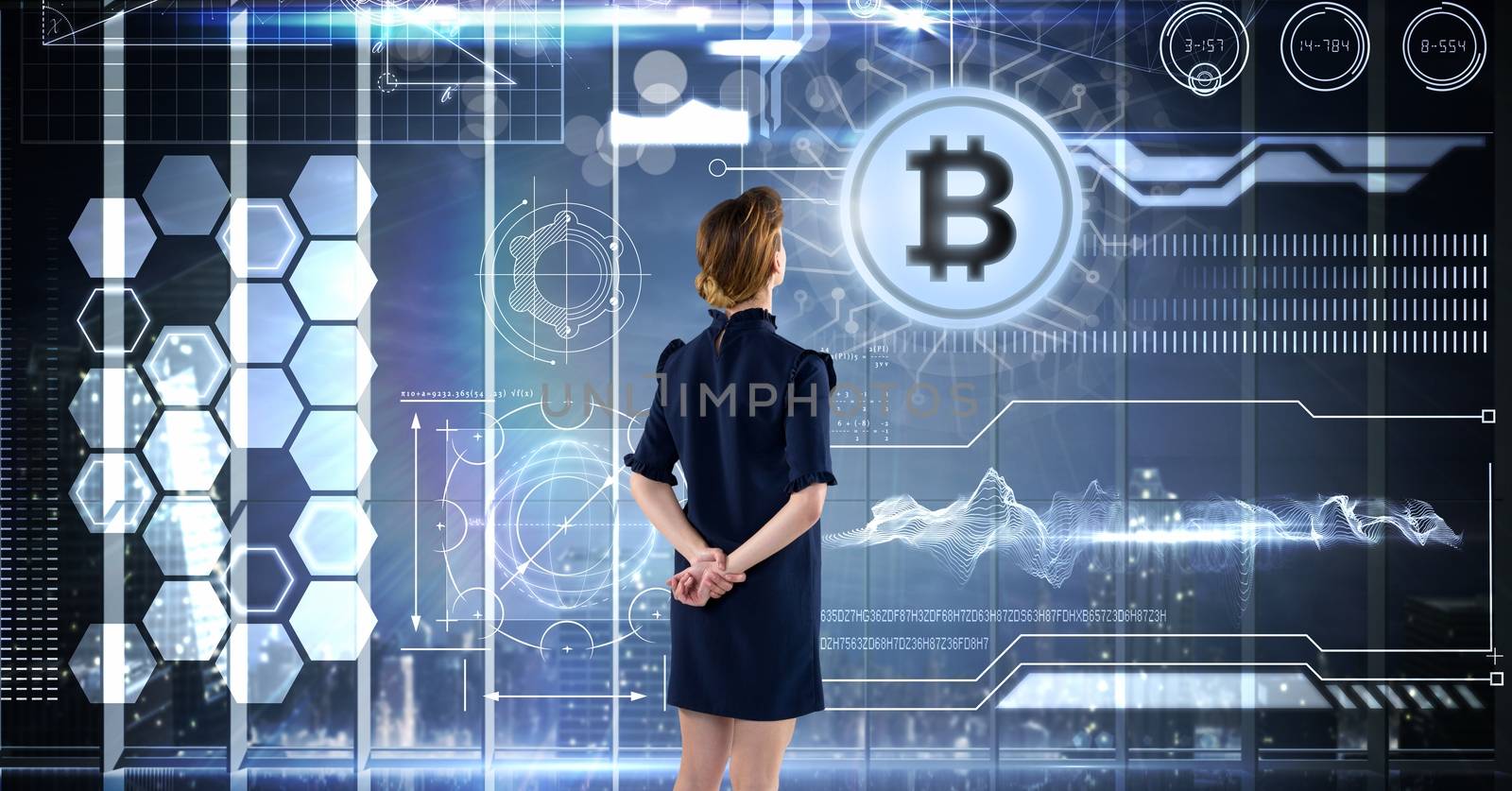 Woman with bitcoin technology information interface by Wavebreakmedia