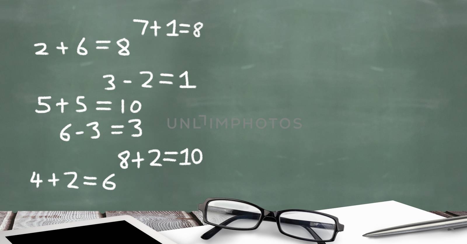 Math Education sums on blackboard for school by Wavebreakmedia