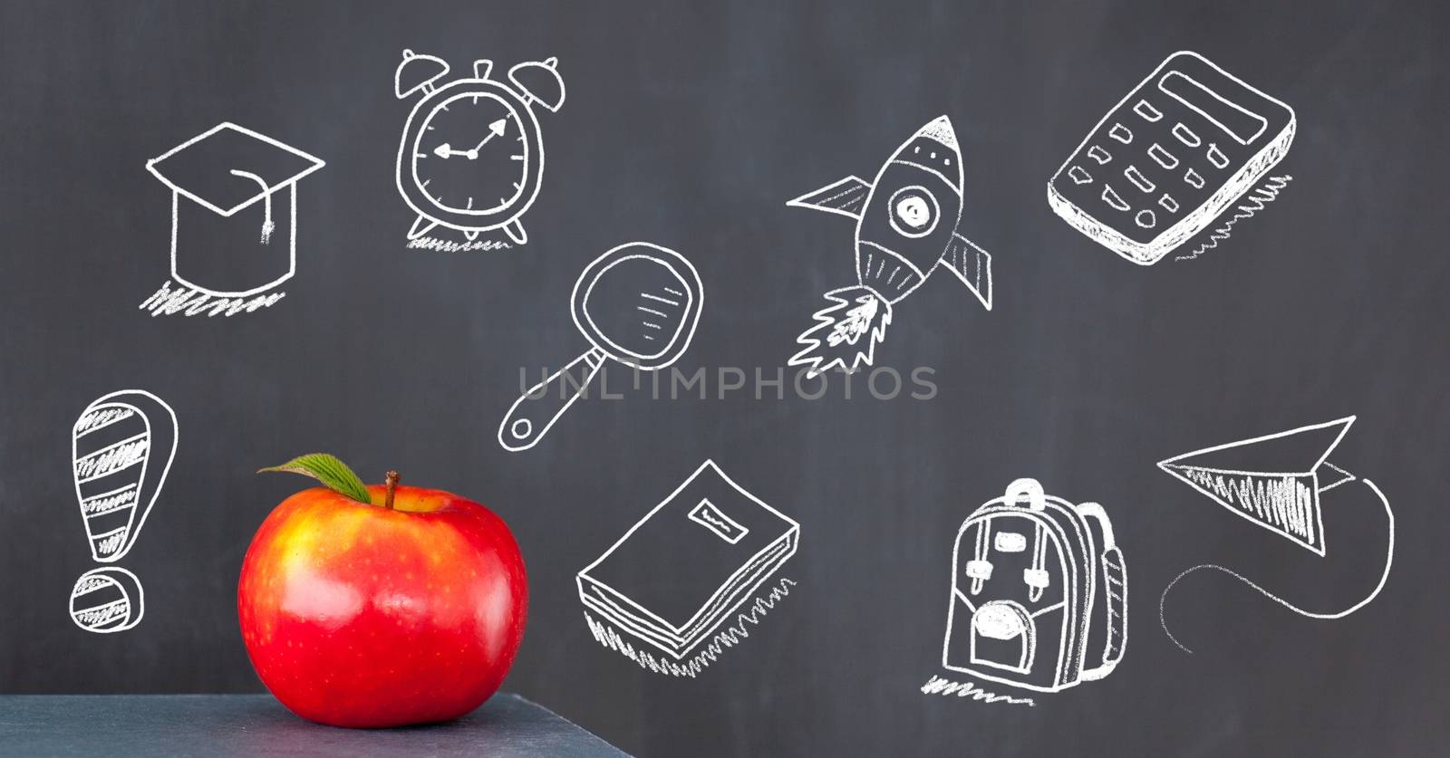 education drawings on blackboard for school with apple by Wavebreakmedia