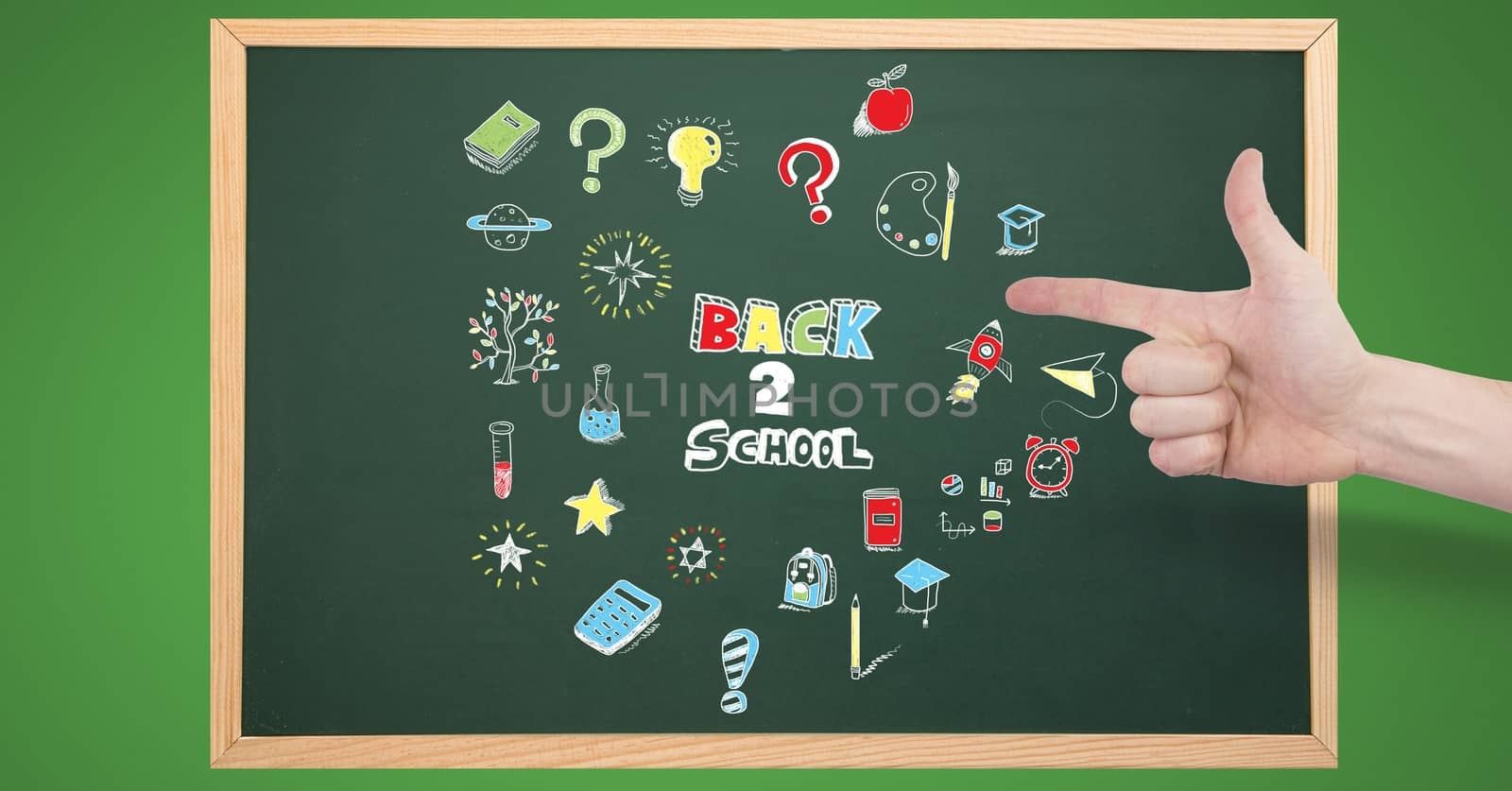 Hand pointing at Back to school Education drawing on blackboard by Wavebreakmedia