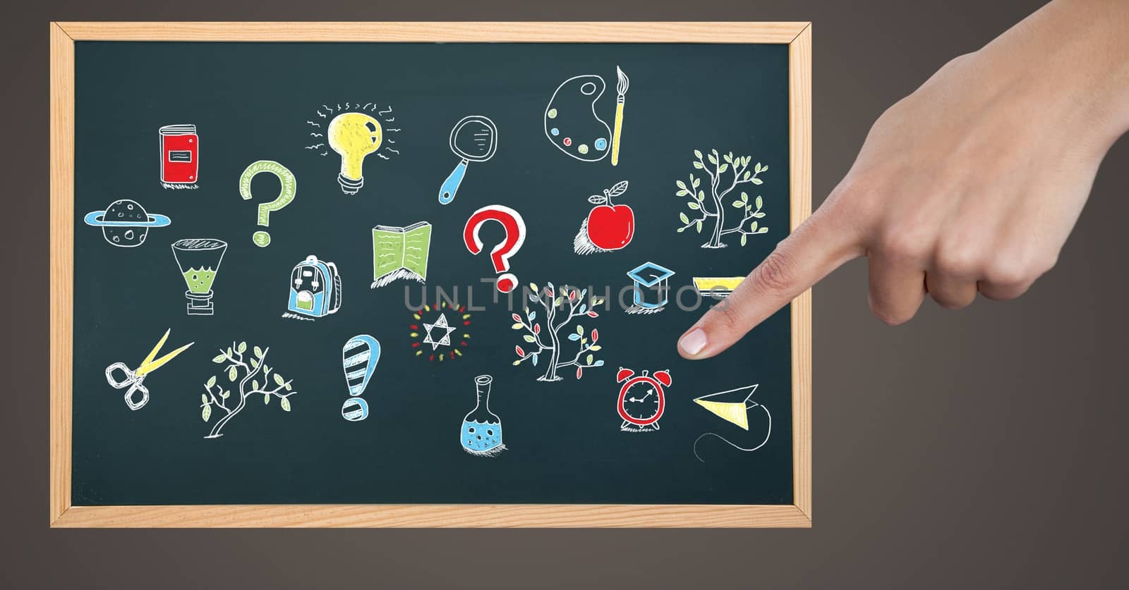 Hand pointing at Education drawing on blackboard for school by Wavebreakmedia