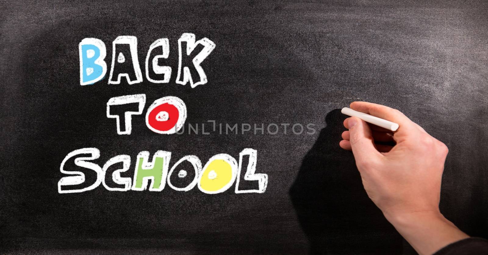 Back to school education drawings on blackboard for school by Wavebreakmedia