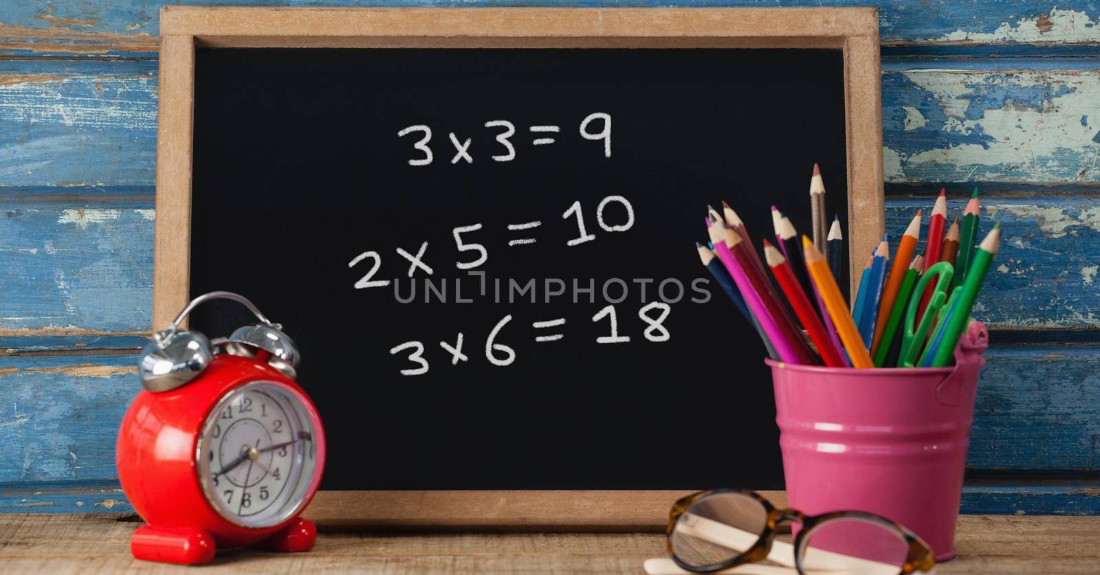 Digital composite of Math education drawings on blackboard for school
