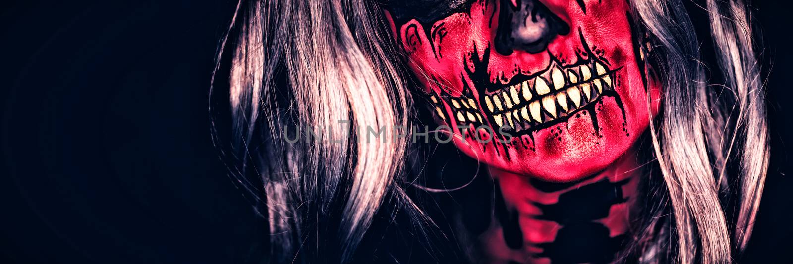 Attractive young woman with Halloween makeup by Wavebreakmedia