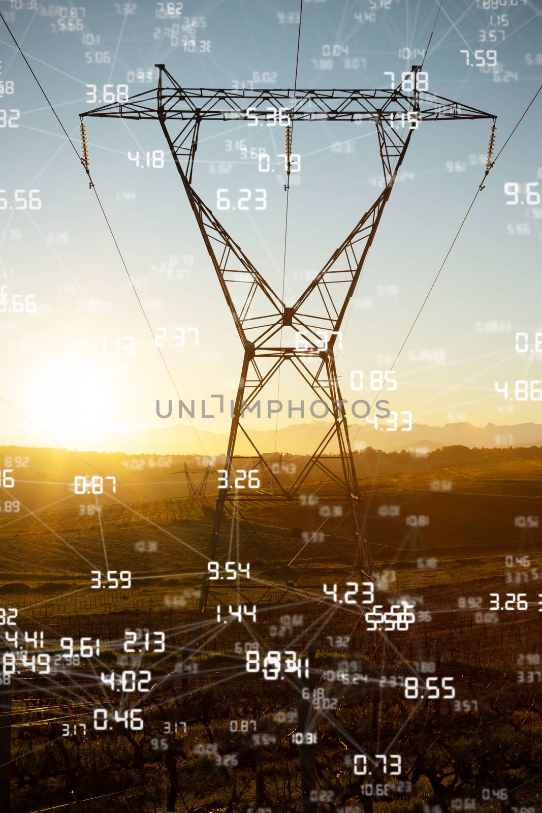 Screen with times against the evening electricity pylon silhouette