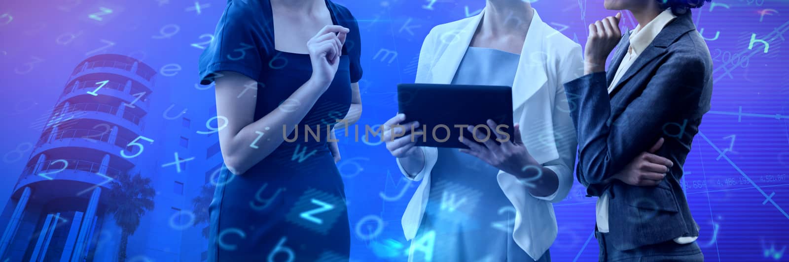Businesswomen discussing over tablet while standing against white backgorund against stocks and shares