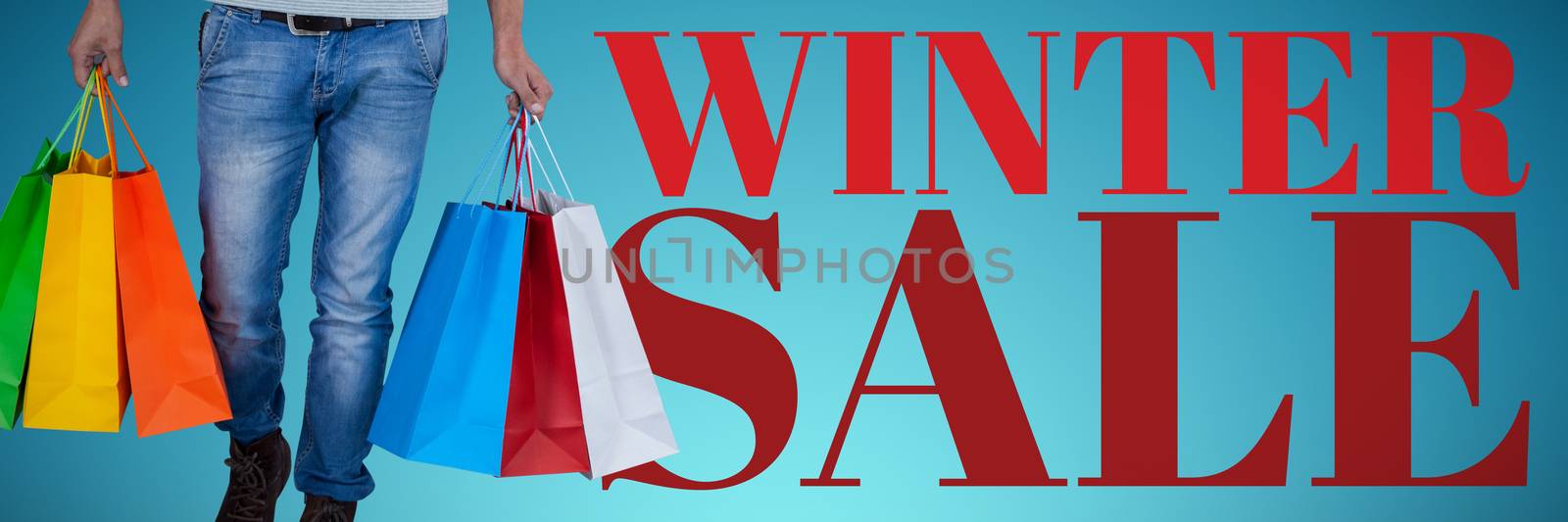 Composite image of portrait of young man carrying colorful shopping bag against white background by Wavebreakmedia