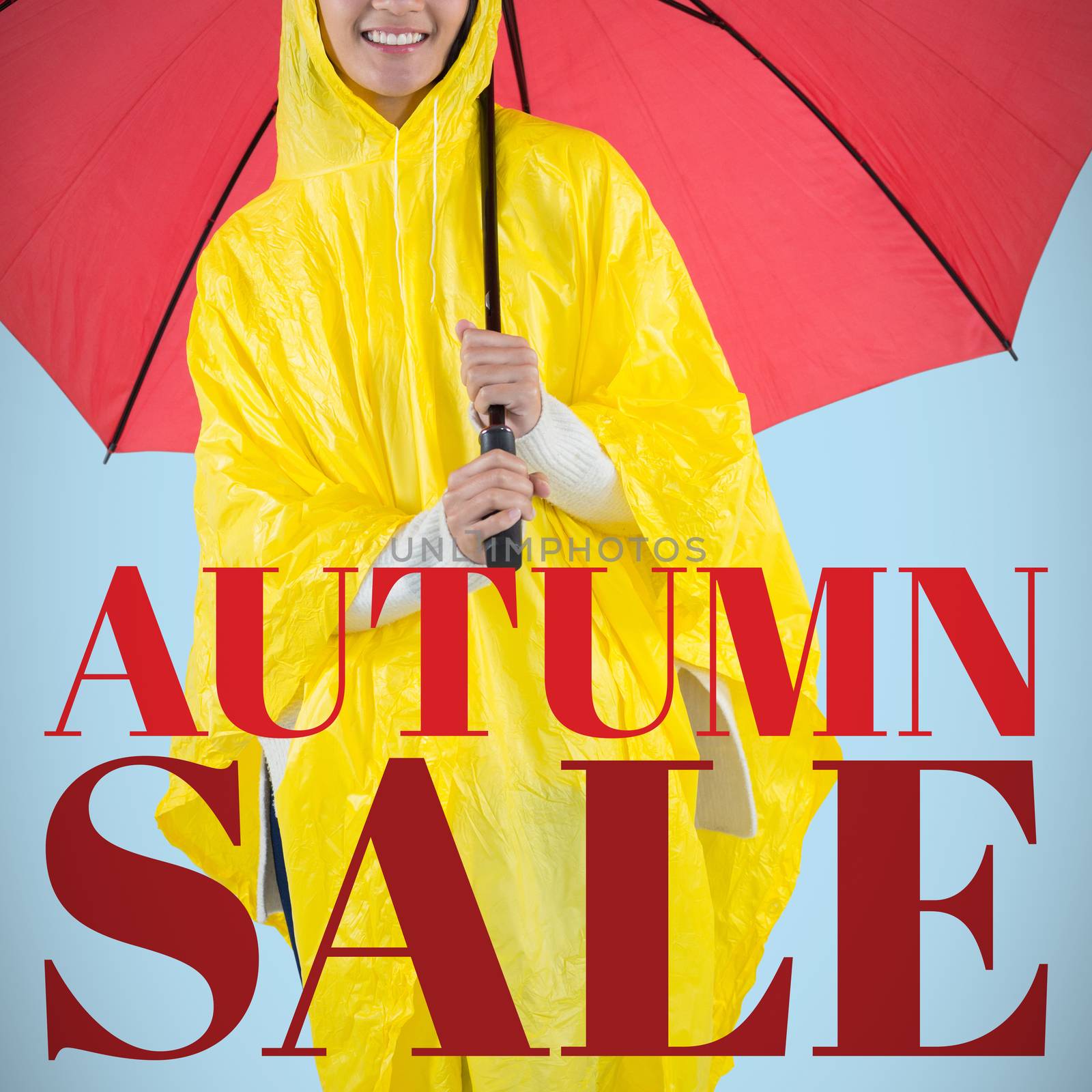Woman in yellow raincoat holding an umbrella against blue background