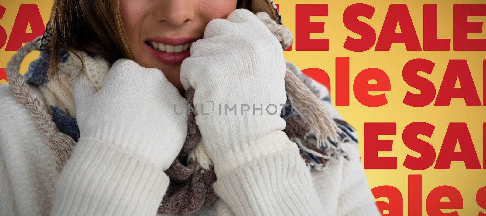 Composite image of close up portrait of smiling young woman in sweater by Wavebreakmedia