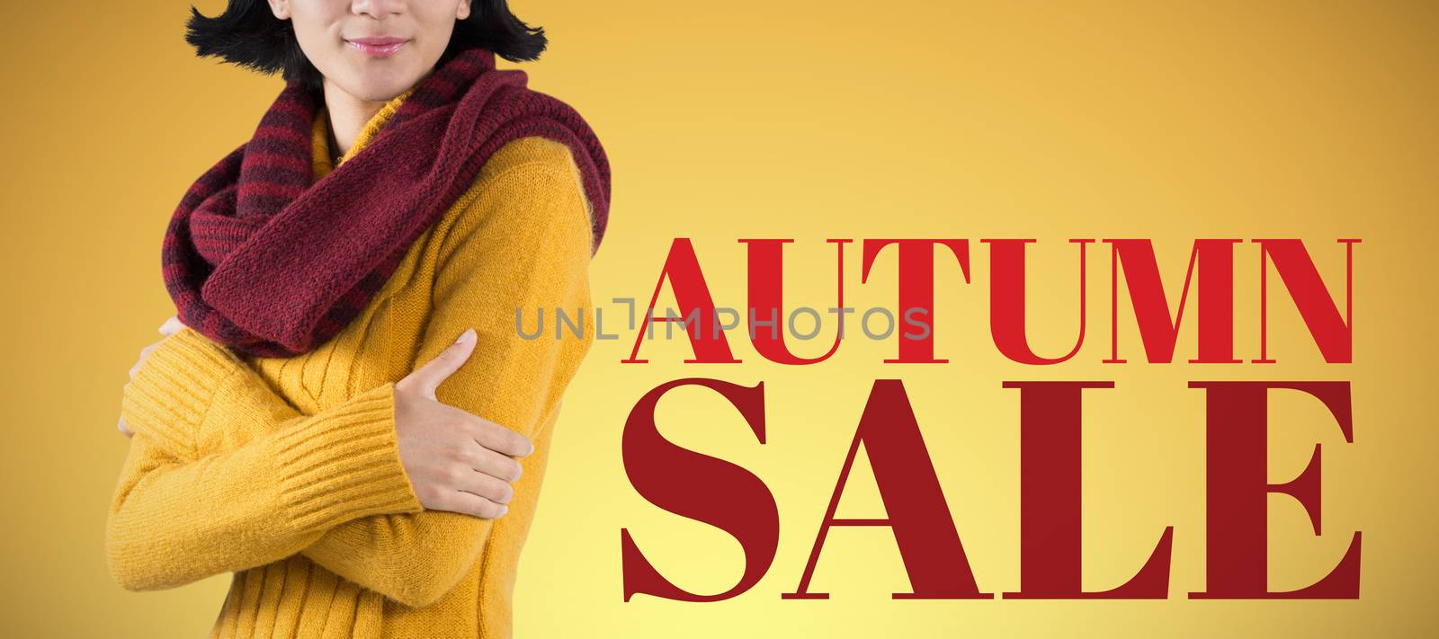 Woman in winter clothing posing against white background against abstract yellow background