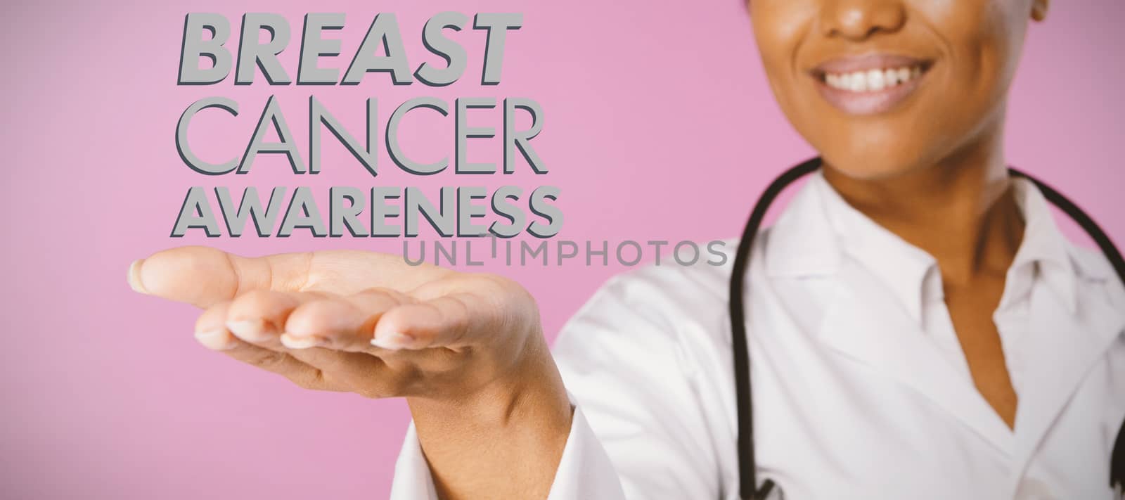 Breast cancer awareness message against smiling nurse shows a copy space with open hand