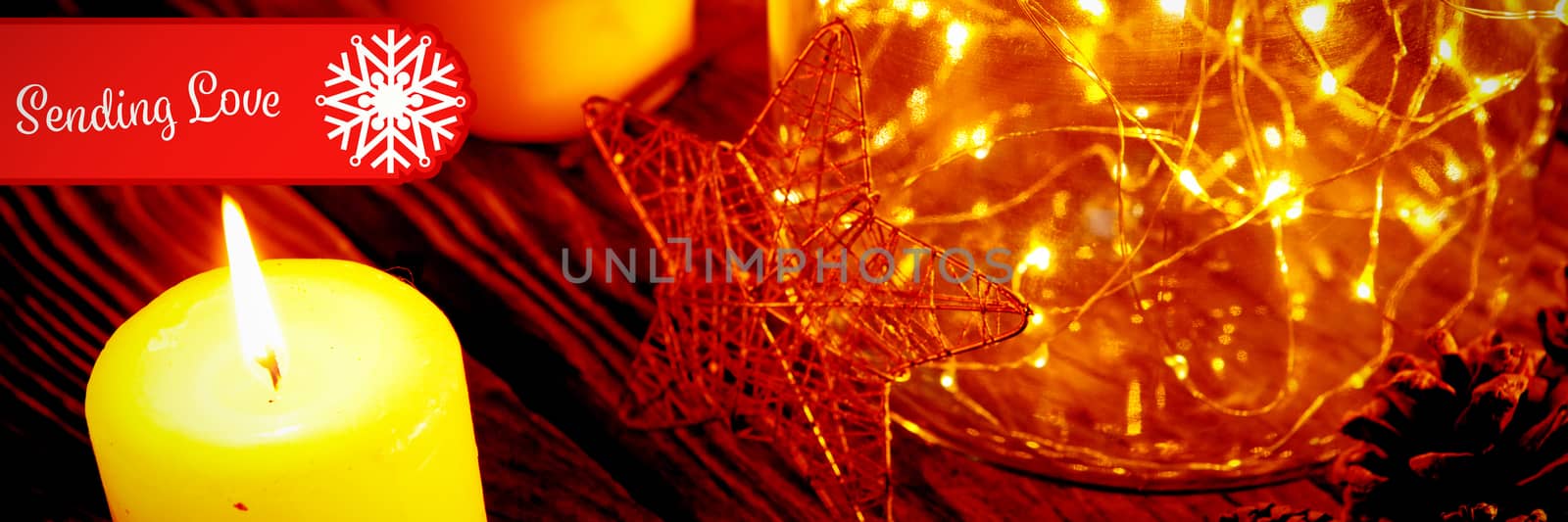 Banner sending love against warm candles and ornament