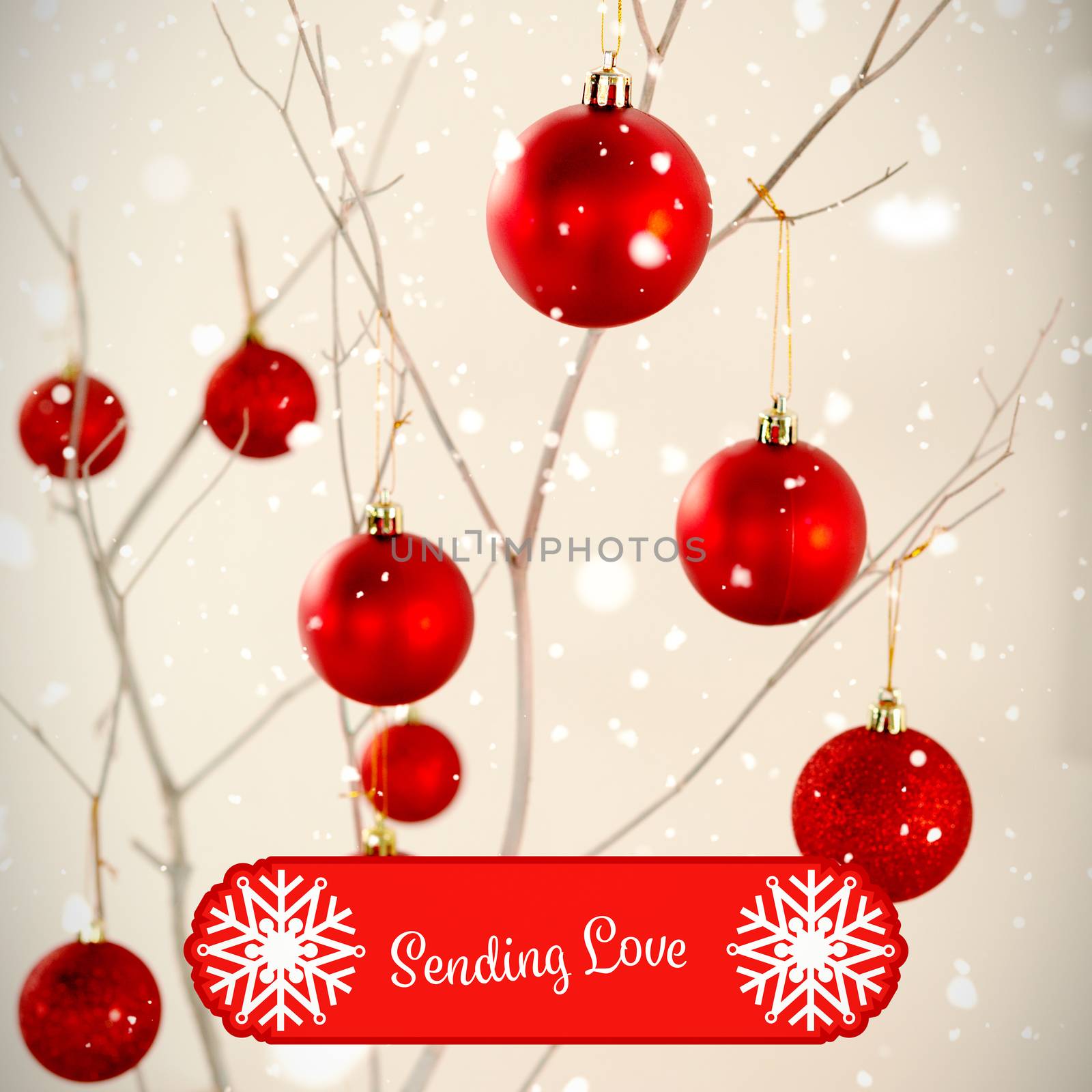 Banner sending love against red christmas balls on branches frame