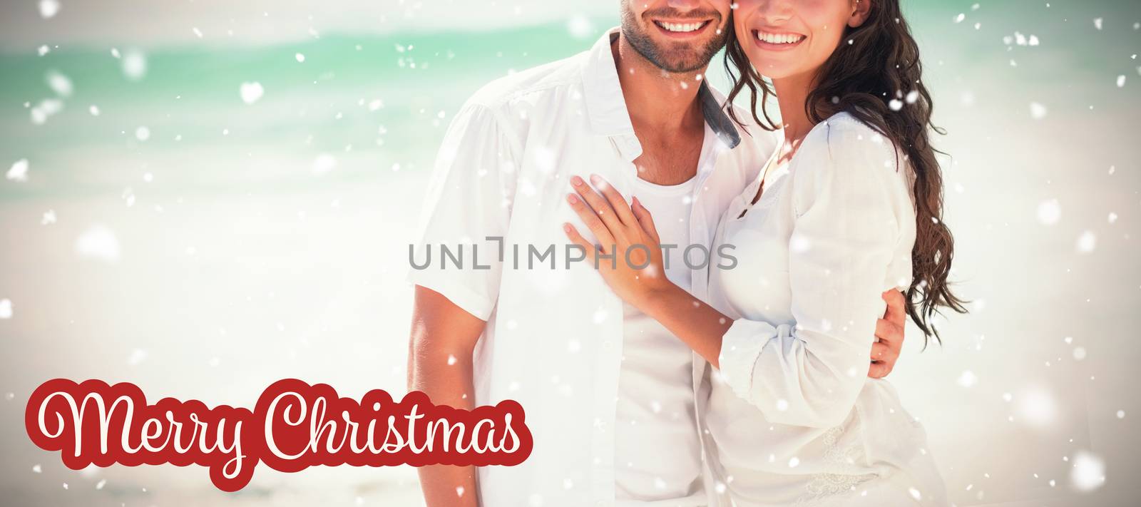 happy couple looking at camera  against white and red greeting card