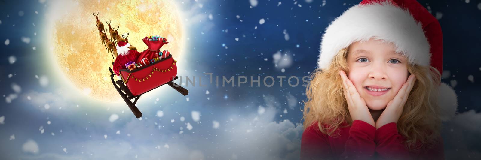 Composite image of cute girl in santa hat by Wavebreakmedia