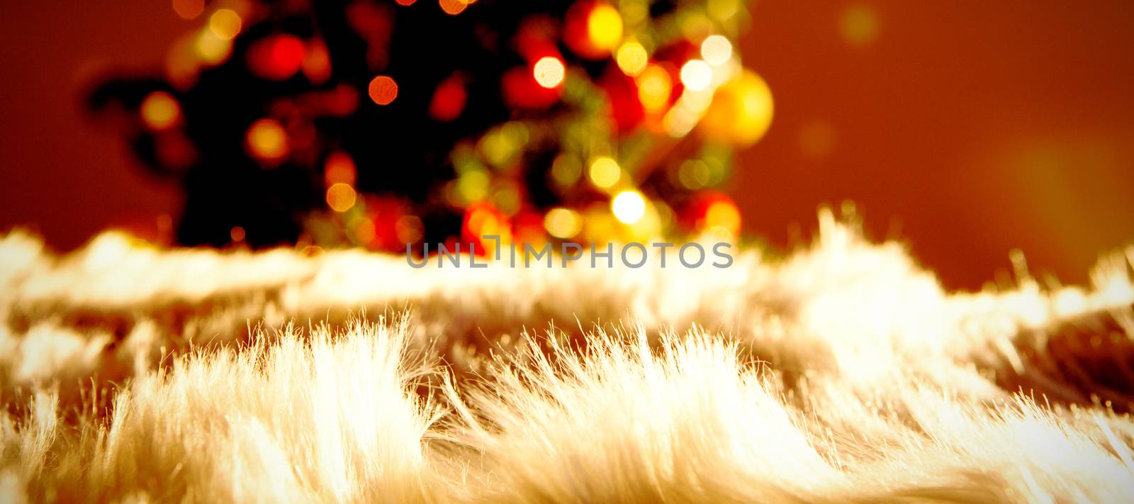 White carpet against unfocused Christmas decoration