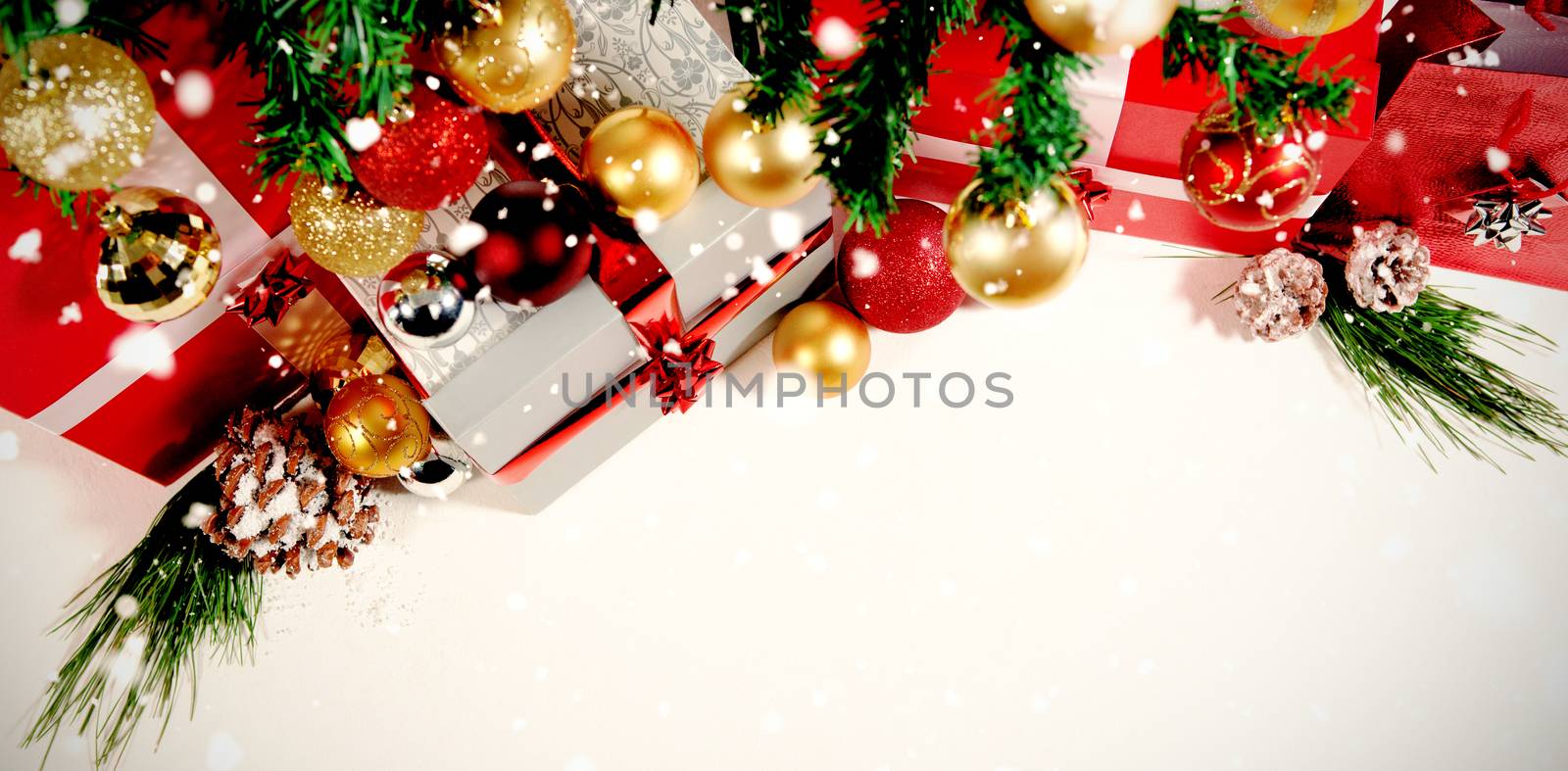 Snow falling against beautiful christmas decoration with copy space