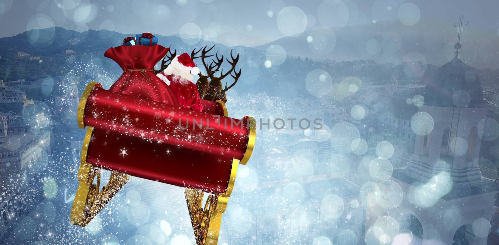 Santa flying his sleigh against beautiful view over houses
