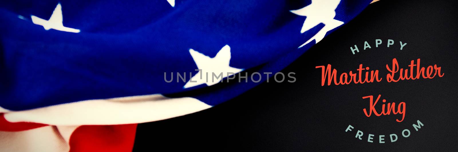 happy Martin Luther King freedom against american flag on empty slate