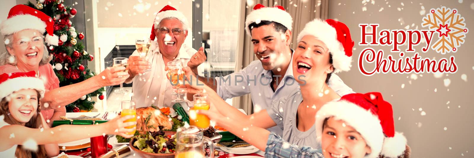 Family in santas hats toasting wine glasses at dining table against christmas card
