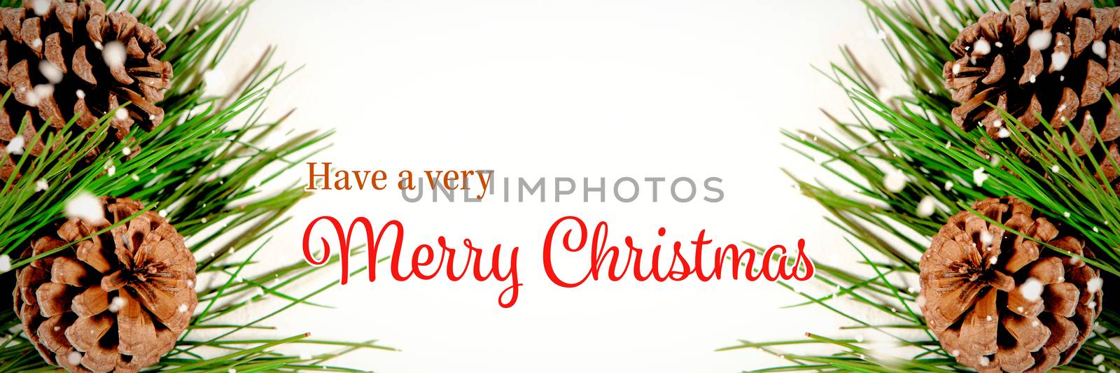 Christmas card against pine cones with copy space
