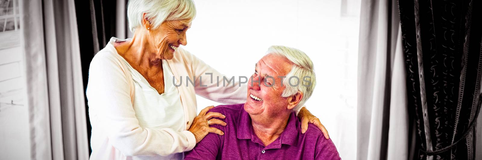 Senior couple looking at each other by Wavebreakmedia