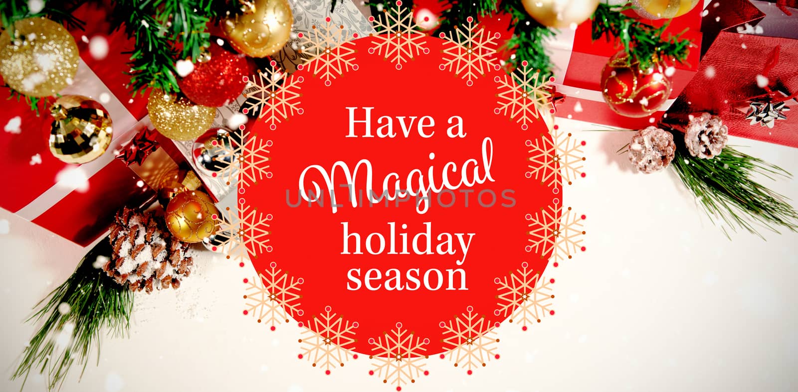 White and red greetings card against beautiful christmas decoration with copy space